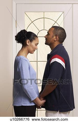 Couple praying together View Large Photo Image Stock Photograph - Couple praying together. Fotosearch