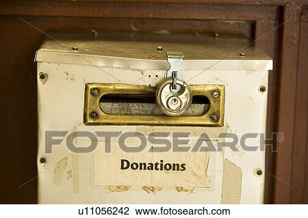 Donation box with lock View Large Photo Image Stock Image - Donation box with lock. Fotosearch