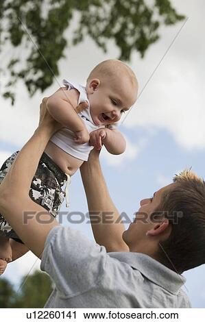 Stock Image - Father and son. Fotosearch