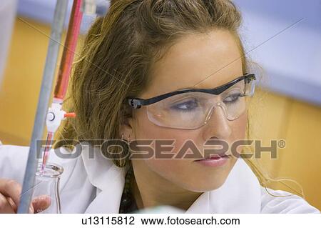 Stock Image - Girl in a science lab. Fotosearch