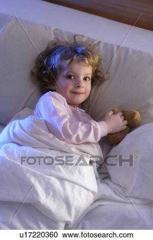 Girl in bed View Large Photo Image Stock Image - Girl in bed. Fotosearch