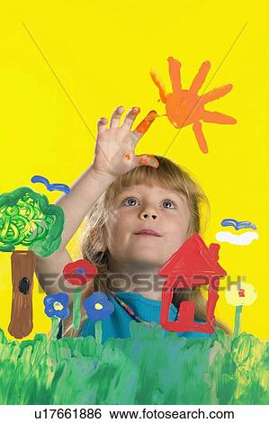 Girl painting on glass View Large Photo Image Stock Photograph - Girl painting on glass. Fotosearch
