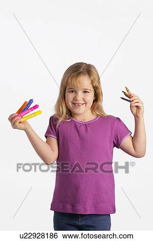 Girl with crayons and markers View Large Photo Image Stock Photograph - Girl with crayons and markers. Fotosearch
