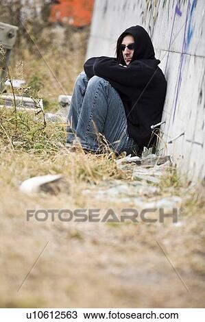 Man beside graffiti View Large Photo Image Stock Image - Man beside graffiti. Fotosearch