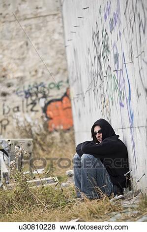 Man beside graffiti View Large Photo Image Stock Photo - Man beside graffiti. Fotosearch