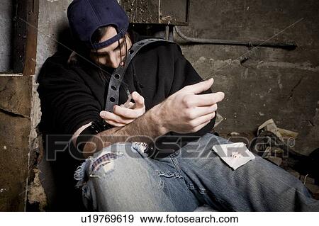 Man using drugs View Large Photo Image Stock Photo - Man using drugs. Fotosearch