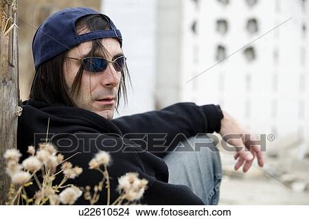 Man wearing sunglasses View Large Photo Image Picture - Man wearing sunglasses. Fotosearch