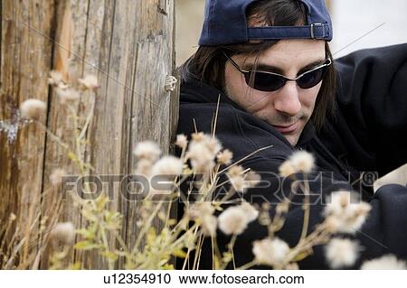 Man wearing sunglasses View Large Photo Image Stock Image - Man wearing sunglasses. Fotosearch