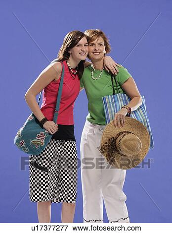 Stock Photo - Mother and daughter hugging. Fotosearch