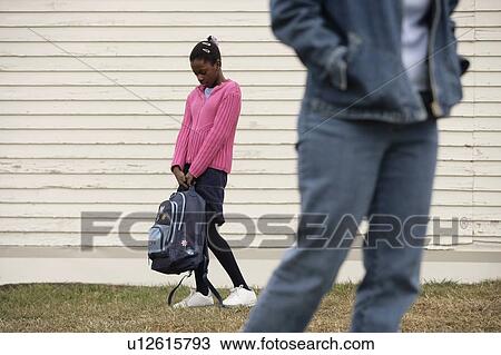 Stock Image - Mother and daughter separated. Fotosearch