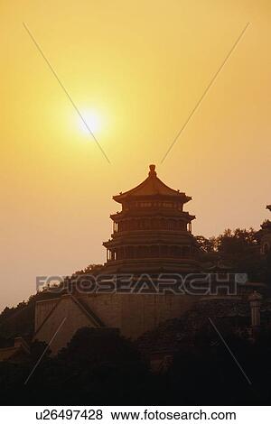 Pagoda in Summer Palace at sunset in Beijing, China View Large Photo Image Stock Photo - Pagoda in Summer Palace at sunset in Beijing, China . Fotosearch