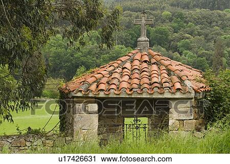 Pantiled roof shrine with stone cross in Rioseco, Northern Spain View Large Photo Image Stock Image - Pantiled roof shrine with stone cross in Rioseco, Northern Spain. Fotosearch
