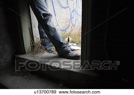 Person beside graffiti View Large Photo Image Stock Photo - Person beside graffiti. Fotosearch