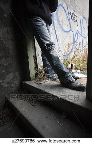 Person beside graffiti View Large Photo Image Stock Photograph - Person beside graffiti. Fotosearch