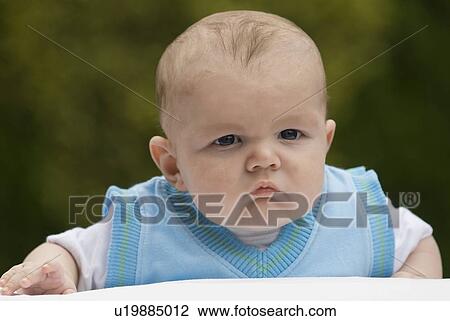 Portrait of a baby boy View Large Photo Image Stock Image - Portrait of a baby boy . Fotosearch