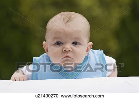 Stock Image - Portrait of a baby boy . Fotosearch