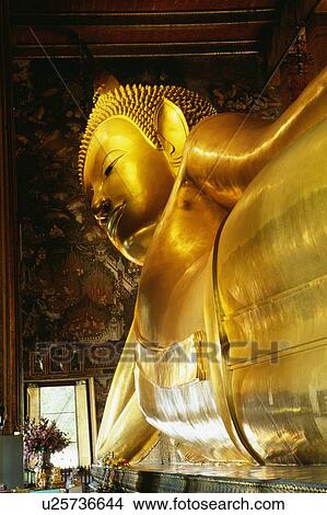 Picture - Reclining Buddha at Wat Po, Bangkok, Thailand. Fotosearch