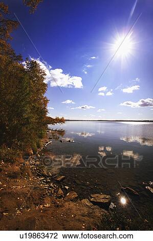 Stock Image - Shoreline at Sylvan Lake, AB, Canada. Fotosearch