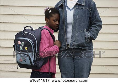 Stock Photo - Shy schoolgirl. Fotosearch