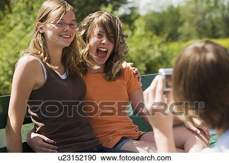 Teenage girls laughing View Large Photo Image Stock Image - Teenage girls laughing. Fotosearch