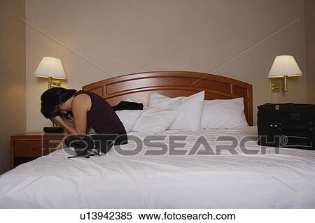 Woman with head in hands View Large Photo Image Stock Photography - Woman with head in hands. Fotosearch