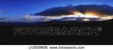 Bantry Bay sunset, Glengarriff with Sugarloaf Mountain, Co Cork, Ireland View Large Photo Image Stock Photo - Bantry Bay sunset, Glengarriff with Sugarloaf Mountain, Co Cork, Ireland. Fotosearch