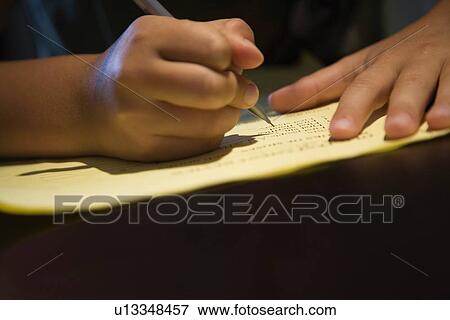 Child writing View Large Photo Image Stock Photo - Child writing. Fotosearch
