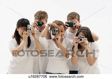 Group of friends with cameras View Large Photo Image Stock Photograph - Group of friends with cameras. Fotosearch