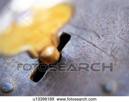 Key in a lock View Large Photo Image Stock Photo - Key in a lock. Fotosearch