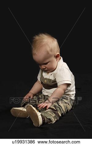 Portrait of a baby boy View Large Photo Image Stock Photograph - Portrait of a baby boy. Fotosearch