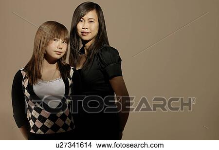 Portrait of mother and daughter View Large Photo Image Picture - Portrait of mother and daughter. Fotosearch