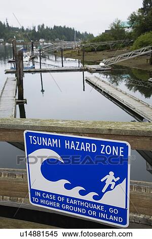Sign saying Tsunami Hazard Zone View Large Photo Image Stock Photography - Sign saying Tsunami Hazard Zone. Fotosearch