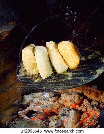 Soda bread cooking on a griddle View Large Photo Image Stock Photography - Soda bread cooking on a griddle. Fotosearch
