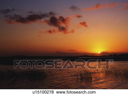 Sunrise at Lough Derg, Co Clare, near Mountshannon, Ireland View Large Photo Image Stock Photo - Sunrise at Lough Derg, Co Clare, near Mountshannon, Ireland. Fotosearch