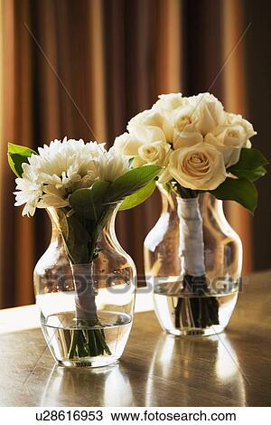 Two vases with flowers View Large Photo Image Stock Image - Two vases with flowers. Fotosearch