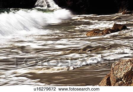 Waves crashing along shoreline View Large Photo Image Stock Image - Waves crashing along shoreline. Fotosearch