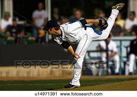 A baseball playing throwing the ball View Large Photo Image Stock Image - A baseball playing throwing the ball. Fotosearch