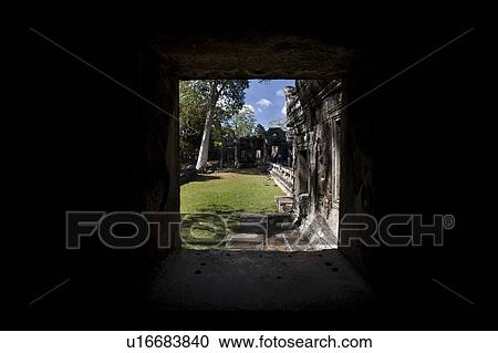Stock Image - A temple in the ancient city of Angkor Wat, in Northwestern Cambodia. Fotosearch