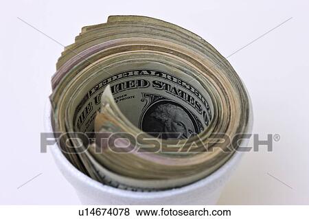 American paper currency in cup View Large Photo Image Stock Photo - American paper currency in cup. Fotosearch
