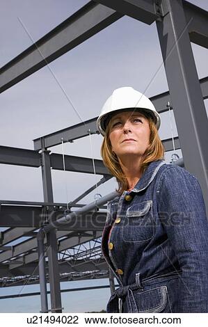 Stock Image - Architect on construction site. Fotosearch
