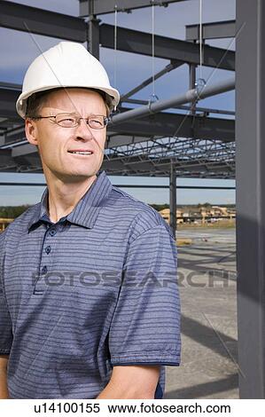 Architect on construction site View Large Photo Image Stock Photography - Architect on construction site. Fotosearch