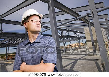 Architect on construction site View Large Photo Image Stock Photography - Architect on construction site. Fotosearch