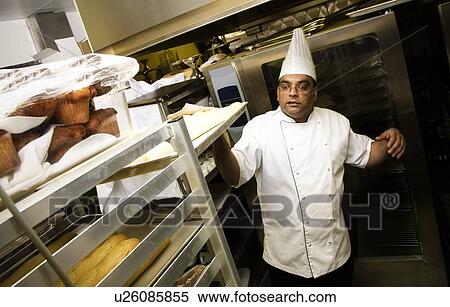 Baker in the kitchen View Large Photo Image Stock Photography - Baker in the kitchen. Fotosearch