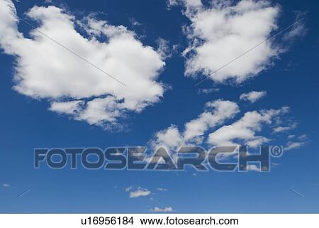 Blue sky with clouds View Large Photo Image Picture - Blue sky with clouds. Fotosearch