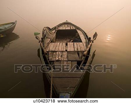 Boat in the water, Varanasi, India View Large Photo Image Stock Photo - Boat in the water, Varanasi, India . Fotosearch