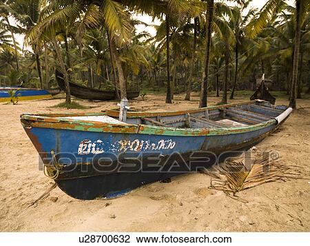 Boat on shore, Arabian Sea, Kerala, India View Large Photo Image Stock Image - Boat on shore, Arabian Sea, Kerala, India . Fotosearch