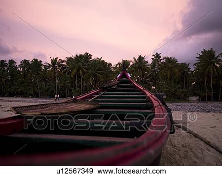 Boat on shore, Arabian Sea, Kerala, India View Large Photo Image Stock Photo - Boat on shore, Arabian Sea, Kerala, India . Fotosearch