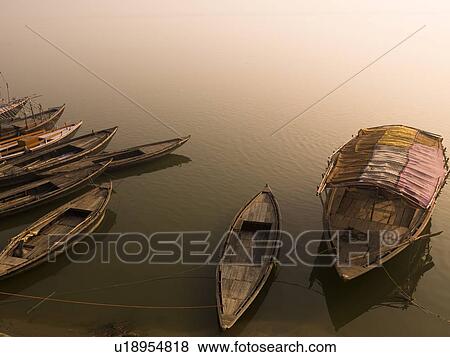 Boats in the water, Varanasi, India View Large Photo Image Stock Photo - Boats in the water, Varanasi, India . Fotosearch