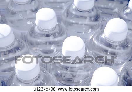 Bottles of water View Large Photo Image Stock Photo - Bottles of water. Fotosearch