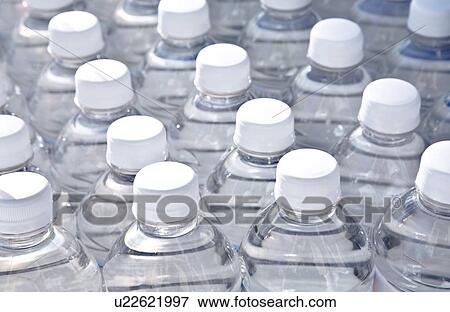 Bottles of water View Large Photo Image Stock Photo - Bottles of water. Fotosearch